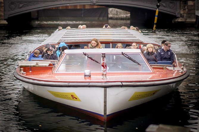 Copenhagen Sightseeing Classic Canal Tour With Live Guide - Christianshavn, old warehouses, and city planning