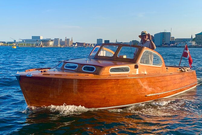 Private Copenhagen Boat cruise in Scandinavian mahogany boat - Starting at Gammel Strand and finding your bearings